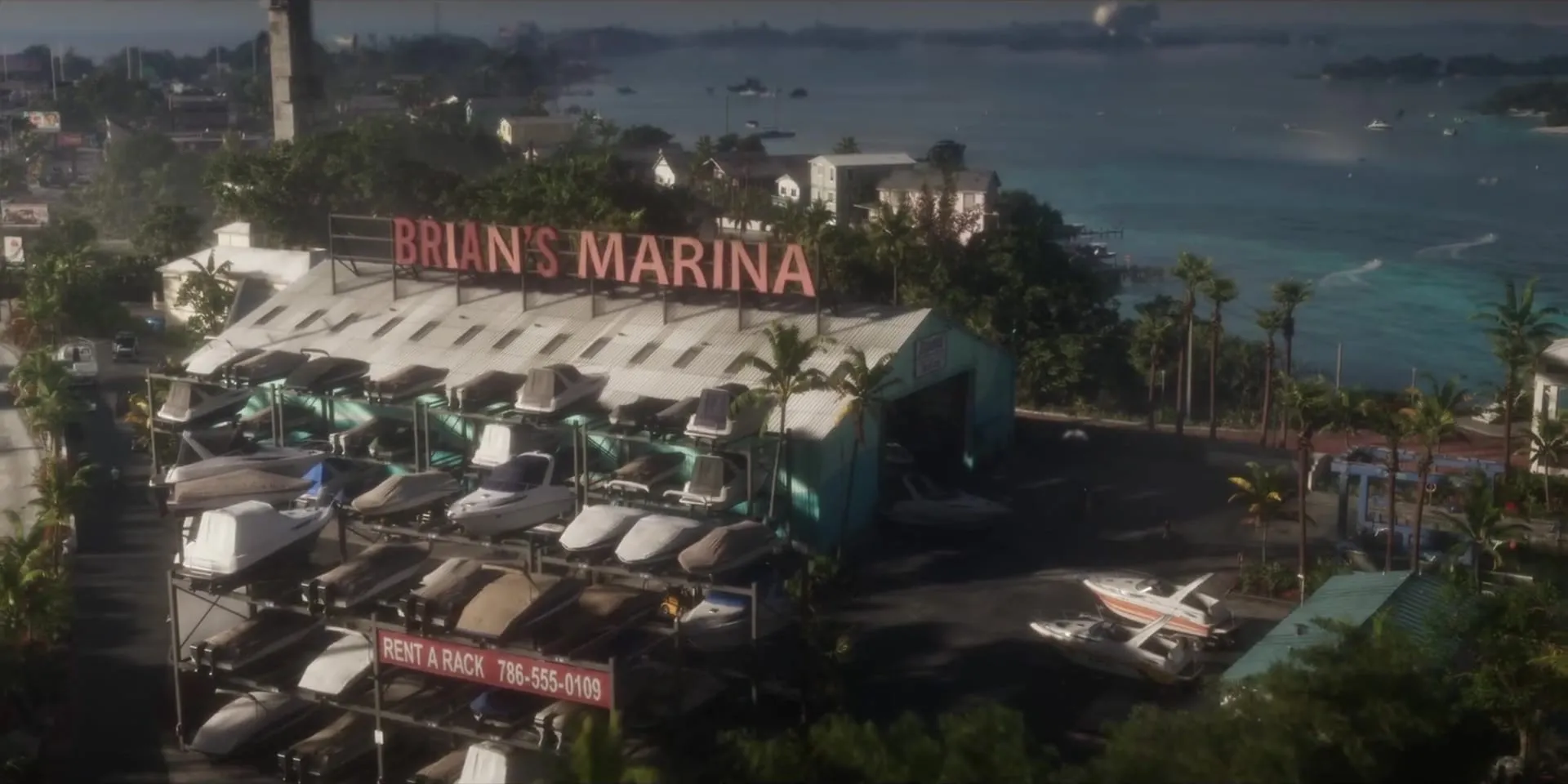 Aerial view of the Brian's Marina shed with racks full of boats and the Keys sea behind