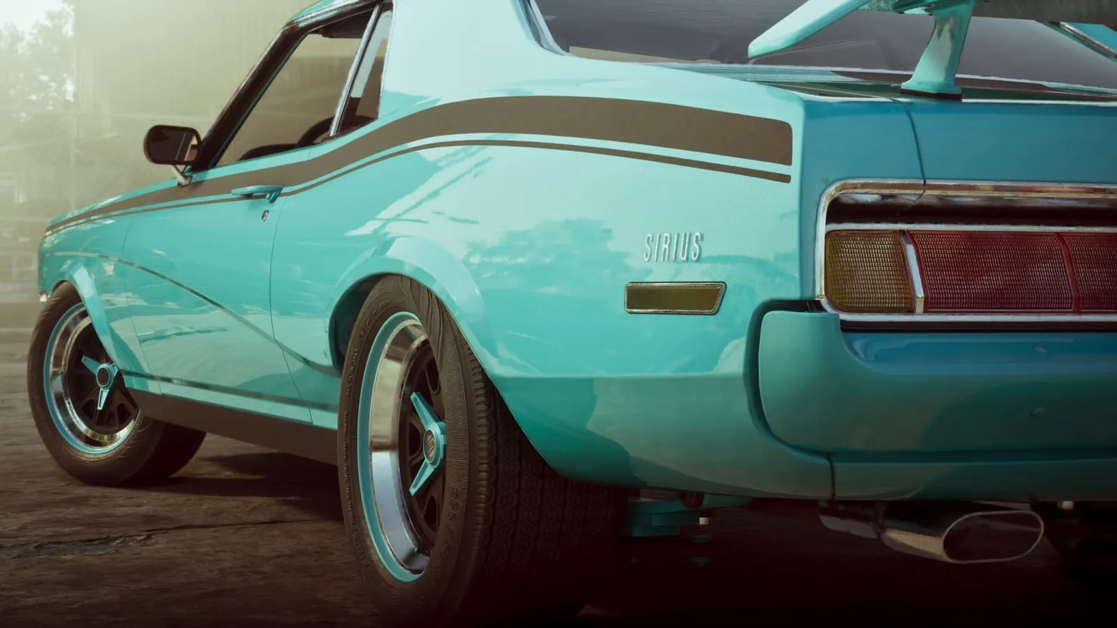 The rear flank of a turquoise muscle car from Wyman's collection, with the Sirius badge next to the tail light